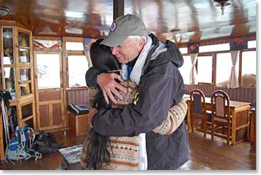 Jim Allen and Yangzing share a blessing and a hug.
