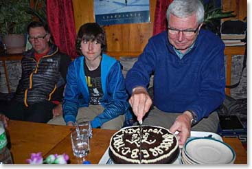 Jackson looks very excited to try the cake!