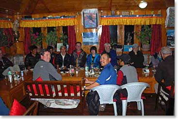 Our happy team of trekkers sits down for one last meal together