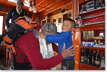 Back in Namche young Paljor was happy to offer blessing scarves to see the team off on their way back to Lukla.