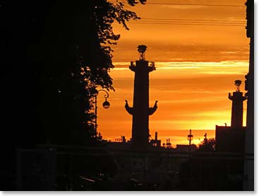 Finally the sun was this low – after 12;30 am the view is of the Rostral columns across the Neva River.