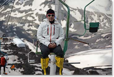 Neil, doing something that is very familiar to him, riding a chair lift at a ski area