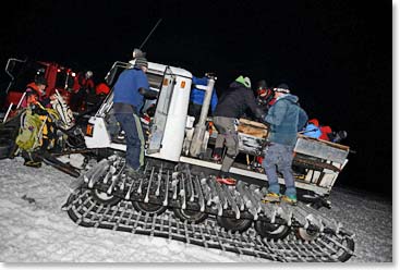 Boarding the snowcat to take us up to Paushtukov rocks at 4:00 am