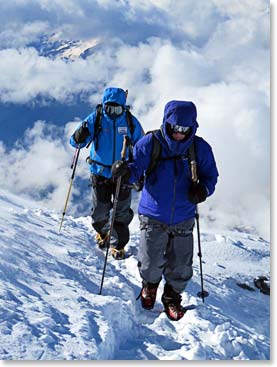 Leslie climbing with his guide Alec