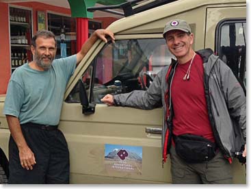 About an hour out of Arusha we made a pit stop. Here Edward and Hugo pause for a photo.