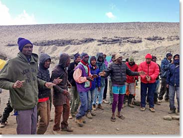BAI staff always welcomes climbers with song and dance
