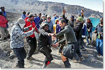 Singing and dancing at High Camp before our summit attempt