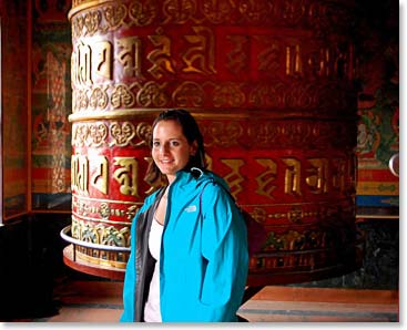 Bonnie at the prayer wheel at the largest Buddhist temple in Kathmandu, Swayambhunath