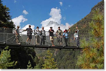 Team on the bridge to Namche