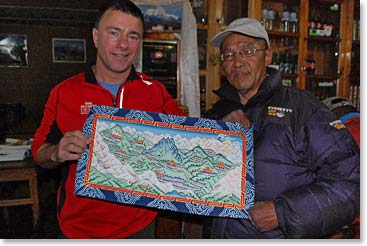 Bob with Pasang and one of his beautiful Thanka paintings