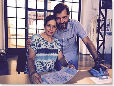 Pedro and Elisa looking at the maps at the park office