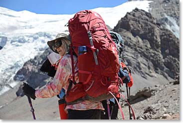 Dena climbing to Plaza Canada with full load of personal gear