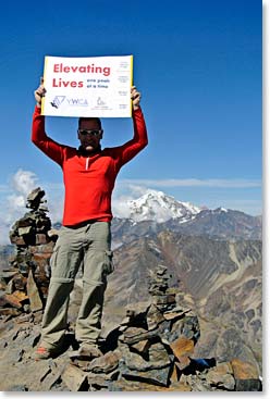 Trevor reaching his first peak dedicated to his fundraiser – Elevation Lives One Peak at a Time