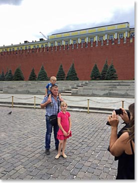 Russian family doing portraits by the Kremlin Wall
