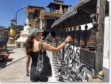 Leah spinning the prayer wheels at Swayambhunath