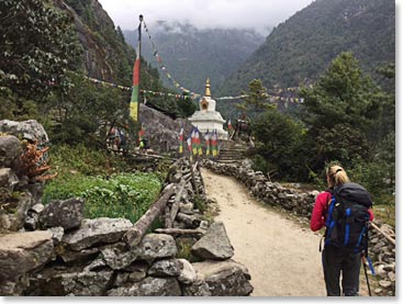 Chorten and prayer flags on the trail to Phakding