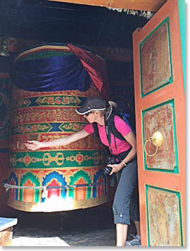 Alison spinning a prayer wheel that we passed along the way