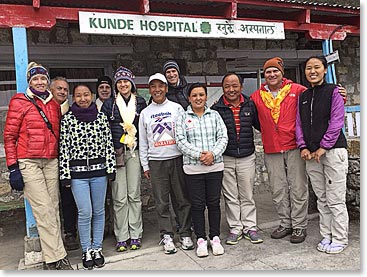 Our team with Dr. Kami and his staff at Khunde Hospital. Two doctors, nurse midwife, and nurses