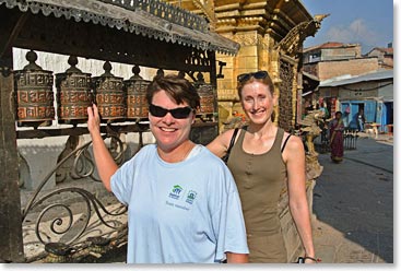 Spinning prayer wheels at Boudhanath