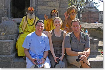 Jen, Johanna and Brent siting with Sadu holy men, Pashupatinath Temple