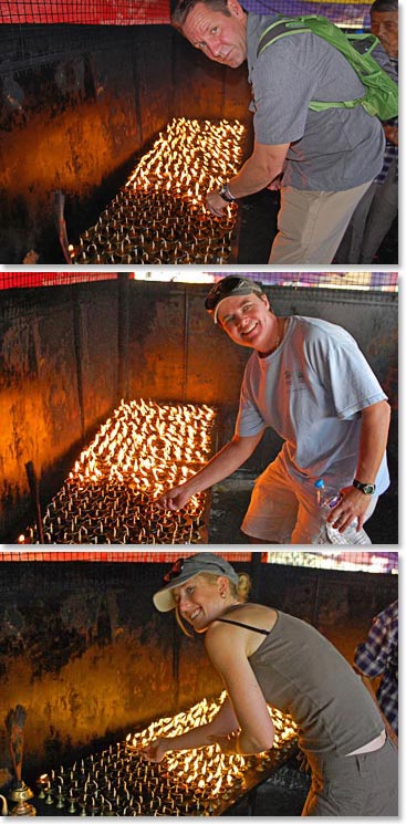 The team, Brent, Jen and Johanna, lighting the blessing butter candles at Swayambhu