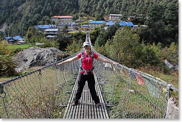 Johanna trying out the suspension bridge to Phakding