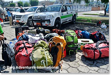 Packing up all of our duffels into the trucks!