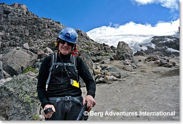 Howard after descending, with the mountain far above