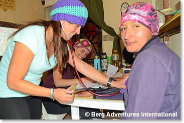 Maria gets her blood pressure checked also by Veronica.