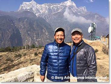 Min and Temba posing in the other direction.  The peak behind them is Kwongde.  