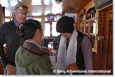 Yangzing offers Khata blessing scarves as we left.