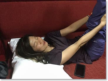 Jennifer stretching a bit after we boarded the train