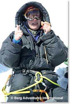 Wild Woman, Jennifer Su, enjoys a snack on the top