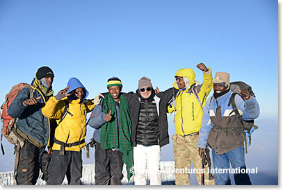 Frank Giustra with Berg Adventures team on the summit of Kilimanjaro