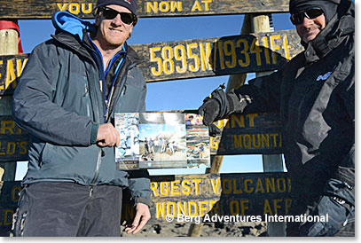 Tim Young and Tony Ritter holding images of a Jade Mine