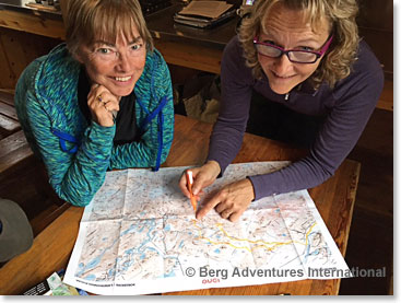 During our trek, before we started our hike every morning, it required a careful planning. Here Rene and Icelandic guide Thora check our route on a map at one of the huts