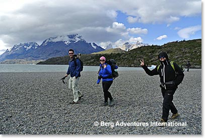 Cole Standish, Staci Wendt and Boris Muller hiking along the lake