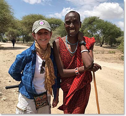 Donna is welcomed to Tarangeri Treetop by one of our Maasai hosts