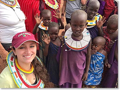 Visiting the Maasai Village was an unexpected and memorable experience. Jessica Souza with the children