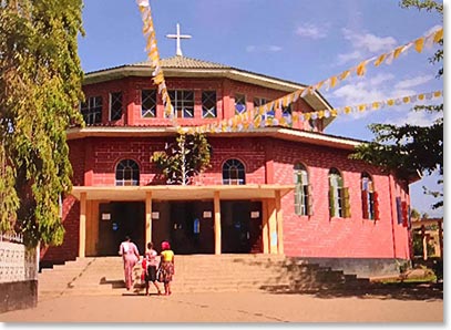 We enjoying going to Church with brightly dressed locals on Sunday morning