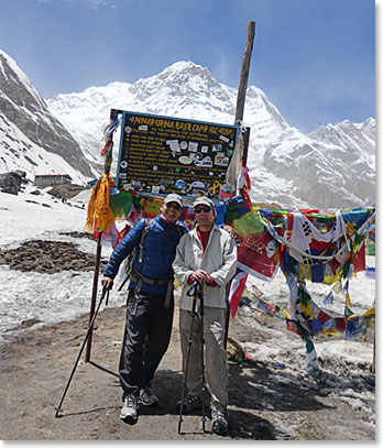 Min and David Cohn in front of Annapurna Basecamp sign, the shot all trekkers get.