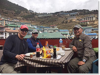 Chris, Mark and Ang Temba enjoy Pizza for lunch in Namche.