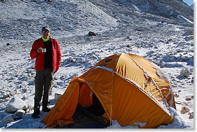 Chris enjoying tea after new snowfall at Island Peak Base Camp