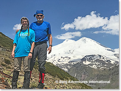 Mathes and Woodie with Mount Elbrus in the background