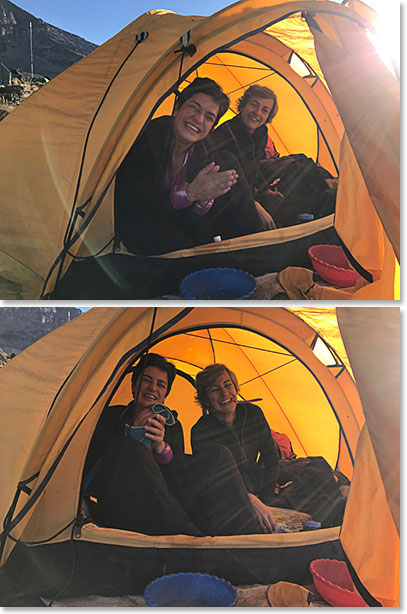 Adriana and Andrea receiving washing water at their tent at Karanga