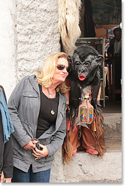 Paula meets the monkey wearing leather pants; at one of Cotacachi most famous leather shops