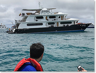 Approaching the Petrel, our catamaran