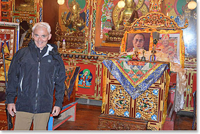 Frank Giustra by the image of Dali Lama at Khunde Monastery