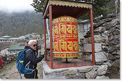 Frank Giustra spinning the prayer wheel