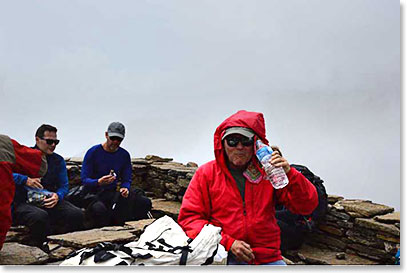 Wally taking water break below Hilary memorial